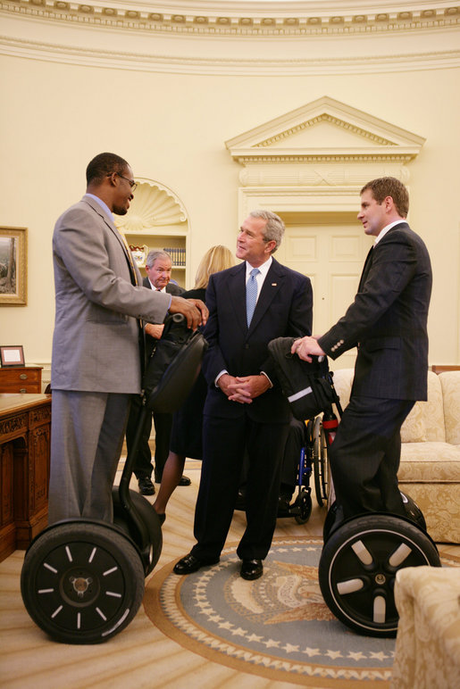 President George W. Bush talks with wounded veterans Sgt.Kortney Clemons, left, of Little Rock, Miss., and Sgt. Ryan Groves of Kent, Ohio, who both use a Segway as a mobility device, on a visit to the Oval office Tuesday, Oct. 16, 2007, attending a meeting of the President's Commission on Care for America's Returning Wounded Warriors. White House photo by Eric Draper