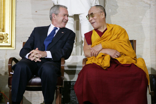President George W. Bush and The Dalai Lama share a laugh Wednesday, Oct. 17, 2007, during the ceremony at the U.S. Capitol in Washington, D.C., for the presentation of the Congressional Gold Medal to The Dalai Lama. White House photo by Chris Greenberg
