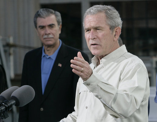 President George W. Bush gestures as he addresses his remarks prior to signing an Executive Order to protect the striped bass and red drum fish populations Saturday, Oct. 20, 2007, at the Chesapeake Bay Maritime Museum in St. Michaels, Md. U.S. Secretary of Commerce Carlos Gutierrez is seen background. White House photo by Eric Draper