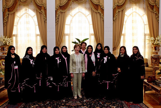 Mrs. Laura Bush pauses for a photo with guests upon conclusion of a social lunch with Sheikha Fatima Bin Mubarak at Sheikha Fatima's Sea Palace Monday, Oct. 22, 2007, in Abu Dhabi, United Arab Emirates. The visit to Abu Dhabi was the first during Mrs. Bush's weeklong visit to the Middle East, where she is scheduled to meet with key officials, medical and educational leaders, and leaders of women's groups. White House photo by Shealah Craighead