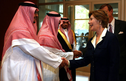 Mrs. Laura Bush is greeted by Mr. Bade Al-Romaih, Guest Relations Manager for the Conference Palace Hotel, upon her arrival for a private lunch Tuesday, Oct. 23, 2007, in Riyadh, Saudi Arabia. White House photo by Shealah Craighead
