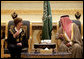 After arriving in Riyadh, Tuesday, Oct. 23, 2007, Mrs. Laura Bush talks with Prince Faisal Bin Abdallah Bin Abd al-Aziz Al Saud, President of the Saudi Cancer Society and President of the Saudi Red Crescent Society. White House photo by Shealah Craighead