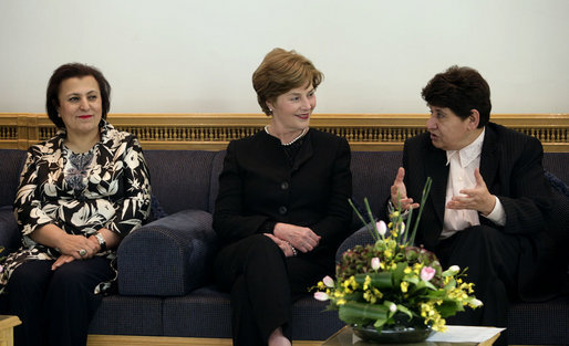 Mrs. Laura Bush speaks with Dr. Rasha al-Sabah, right, Under Secretary of the Ministry of Higher Education, during a Diwaniya held by political women leaders Wednesday, Oct. 24, 2007, in Kuwait City, Kuwait. Also pictured is the Minister of Education Dr. Nouriyah Al-Sabih. White House photo by Shealah Craighead