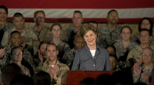 Mrs. Laura Bush addresses American troops Thursday, Oct. 25, 2007, at Ali Al Salem Air Base near Kuwait City. "With your courage and compassion, you show that the United States military is one of the greatest forces for good in the world," Mrs. Bush told the troops. "And I hope you know that we pray. for an end to the violence everywhere so that future generations can grow up in a world at peace -- a world that you shaped." White House photo by Lynden Steele