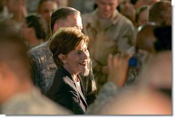 Mrs. Laura Bush meets troops after addressing them Thursday, Oct. 25, 2007, at Ali Al Salem Air Base near Kuwait City. Mrs. Bush told her audience, "Ali Al Salem is the first base where American and Kuwaiti flags were flown together. This is the perfect place to recognize the friendship between Kuwait and the United States -- and to thank all of the Kuwaitis who support our American Armed Forces." White House photo by Lynden Steele