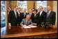 President George W. Bush signs H.R. 3678 the Internet Tax Freedom Act Amendments Act of 2007, Wednesday, Oct. 31, 2007 in the Oval Office, joined by from left, Rep. Bob Goodlatte of Virginia, Rep. Lamar Smith of Texas, Sen. John Sununu of New Hampshire, Rep. Chris Cannon of Utah, Rep. Anna Eshoo of California, Sen. Tom Carper of Delaware and Sen. Lamar Alexander of Tennessee. White House photo by Eric Draper