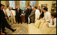 Members of the World Series Champion, Warner Robins, Georgia Little League team break out in laughter as President George W. Bush rubs the head of first baseman Micah Wells during a visit Thursday, Nov. 1, 2007, to the Oval Office. The 12-year-old went 1 for 3 in the team's 3-2 championship win over Japan. White House photo by Eric Draper