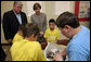 Mrs. Laura Bush visits with Taconi Elementary fifth graders Friday, Nov. 2, 2007, in Ocean Springs, Miss., prior to delivering remarks during the announcement of the Coastal Ecosystem Learning Center Designation and Marine Debris Initiative. The Marine Debris Initiative focuses on identifying, reducing and preventing debris in the marine environment through public and private partnerships, education and international cooperation. White House photo by Shealah Craighead