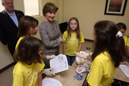 Mrs. Laura Bush visits with Taconi Elementary fifth graders Friday, Nov. 2, 2007, in Ocean Springs, Miss., prior to delivering remarks during the announcement of the Coastal Ecosystem Learning Center Designation and Marine Debris Initiative. The students worked with Gulf Coast Research Laboratory graduate students from the University of Southern Mississippi to learn the importance of prevention, reducing, and removal of ocean and coastal debris. White House photo by Shealah Craighead