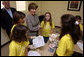 Mrs. Laura Bush visits with Taconi Elementary fifth graders Friday, Nov. 2, 2007, in Ocean Springs, Miss., prior to delivering remarks during the announcement of the Coastal Ecosystem Learning Center Designation and Marine Debris Initiative. The students worked with Gulf Coast Research Laboratory graduate students from the University of Southern Mississippi to learn the importance of prevention, reducing, and removal of ocean and coastal debris. White House photo by Shealah Craighead