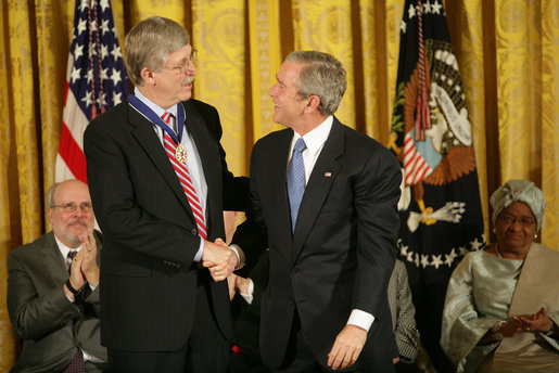 President George W. Bush awards the Presidential Medal of Freedom to physician Francis S. Collins, director of the National Human Genome Research Institute, in the East Room Nov. 5, 2007. White House photo by Eric Draper