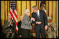 President George W. Bush awards the Presidential Medal of Freedom to author Harper Lee during a ceremony Monday, Nov. 5, 2007, in the East Room. "To Kill a Mockingbird has influenced the character of our country for the better. It's been a gift to the entire world. As a model of good writing and humane sensibility, this book will be read and studied forever," said the President about Harper Lee's work. White House photo by Eric Draper