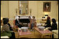 Mrs. Laura Bush hosts a tea for Mrs. Emine Erdogan, wife of Prime Minister Recep Tayyip Erdogan of Turkey, Monday, Nov. 5, 2007, in the Yellow Oval Room within the private residence of the White House. White House photo by Shealah Craighead