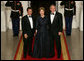 President George W. Bush and Mrs. Laura Bush stand with President Nicolas Sarkozy of France on the North Portico of the White House after his arrival for dinner Tuesday, Nov. 6, 2007. White House photo by Chris Greenberg