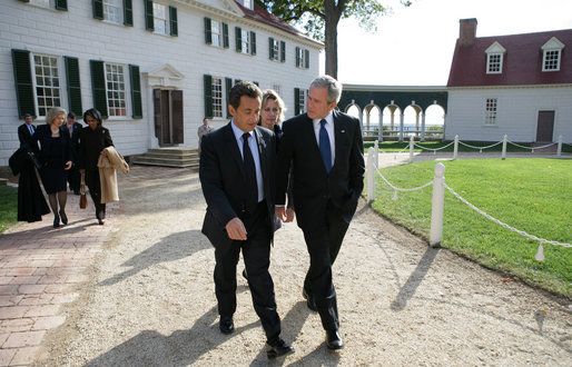 President George W. Bush and President Nicolas Sarkozy of France walk a path from George Washington's mansion during their tour Wednesday, Nov. 7, 2007, of the first president's home. White House photo by Eric Draper