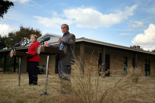 President George W. Bush speaks during a press conference with German Chancellor Angela Merkel at the Bush Ranch in Crawford, Texas, Saturday, Nov. 10, 2007. White House photo by Shealah Craighead