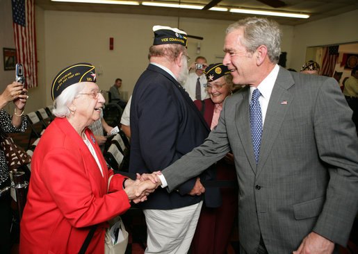 President George W. Bush greets members of the audience after attending a Fallen Soldiers National Memorial Ceremony at the American Legion Post 121 in Waco, Texas Sunday, Nov. 11, 2007. White House photo by Eric Draper
