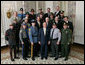 President George W. Bush meets with members of the National Troopers Coalition in the State Dining Room of the White House, Wednesday, Nov. 14, 2007. Founded in 1977, the National Troopers Coalition represents the interests of state troopers and highway patrolmen and offers means to improve police services by stimulating national cooperation and elevating standards of policing. White House photo by Chris Greenberg
