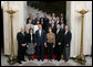 President George W. Bush and Mrs. Laura Bush stand with the crew members of the Space Shuttle Discovery (STS-116), Space Shuttle Atlantis (STS-117), Space Shuttle Endeavour (STS-118), and International Space Station Expeditions 14 and 15, Wednesday, Nov. 14, 2007 in the Grand Foyer of the White House. Since December 2006, NASA astronauts have journeyed more than 15 million miles in space and conducted more than a dozen space walks. White House photo by Chris Greenberg