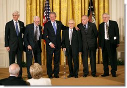 President George W. Bush presents the 2007 National Humanities Medal for the Monuments Men Foundation for the Preservation of Art to, from left, Robert Edsel and World War II veterans Jim Reeds, Harry Ettlinger, Horace Apgar and Seymore Pomrenze.  White House photo by Eric Draper