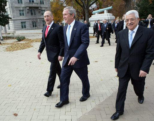 President George W. Bush, Prime Minister Ehud Olmert, left, of Israel, and President Mahmoud Abbas of the Palestinian Authority walk to Bancroft Hall on the grounds of the U.S. Naval Academy in Annapolis, Maryland, during the Annapolis Conference Tuesday, Nov. 27, 2007. White House photo by Chris Greenberg