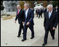President George W. Bush, Prime Minister Ehud Olmert, left, of Israel, and President Mahmoud Abbas of the Palestinian Authority walk to Bancroft Hall on the grounds of the U.S. Naval Academy in Annapolis, Maryland, during the Annapolis Conference Tuesday, Nov. 27, 2007. White House photo by Chris Greenberg