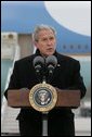 President George W. Bush delivers a statement on Iran Wednesday, Dec. 5, 2007, upon arrival at Eppley Airfield in Omaha. Said the President, "It is clear. that the Iranian government has more to explain about its nuclear intentions and past actions." White House photo by Chris Greenberg