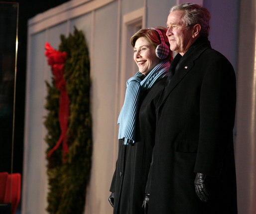 President George W. Bush and Mrs. Laura Bush arrive on stage at the Ellipse in Washington, D.C., Thursday, Dec. 6, 2007, for the lighting of the National Christmas Tree. White House photo by Shealah Craighead