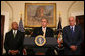 President George W. Bush is flanked by Secretary Alphonso Jackson, left, of the Department of Housing and Urban Development, and Secretary Hank Paulson of the Department of the Treasury, as he delivers a statement Thursday, Dec. 6, 2007, at the White House, on the Administration's efforts on housing. White House photo by Joyce N. Boghosian