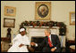 President George W. Bush shakes hands with President Umaru Yar'Adua of Nigeria, as he welcomes him to the Oval Office Thursday, Dec. 13, 2007, at the White House. Said President Bush, "Mr. President, I am impressed by your commitment to reform, your adherence to the concept of rule of law, and your belief in transparency. And I congratulate you for being a strong leader." White House photo by Joyce N. Boghosian