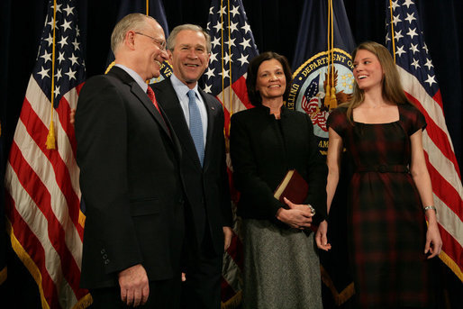 President George W. Bush smiles as he stands with Secretary of Veteran Affairs Lt. Gen. James Peake (Ret.), his wife, Janice, and daughter, Kimberly, after the former Army Surgeon General was sworn in during the ceremonial event Thursday, Dec. 20, 2007, at the U.S. Department of Veterans Affairs. White House photo by Chris Greenberg