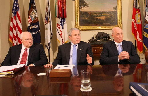 President George W. Bush, joined by Vice President Dick Cheney and U.S. Treasury Secretary Henry Paulson, right, addresses reporters Friday, Jan. 4, 2008 in the Roosevelt Room at the White House, following a meeting with the President's Working Group on Financial Markets. White House photo by Eric Draper