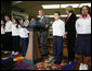 President George W. Bush visits with students Monday, Jan. 7, 2008, at the Horace Greeley Elementary School in Chicago, joined by U.S. Secretary of Education Margaret Spellings, right, where President Bush also delivered a statement highlighting the successes of No Child Left Behind and urged Congress to reauthorize it. White House photo by Joyce N. Boghosian