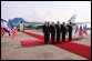 President George W. Bush is joined on the red carpet by Israel’s Prime Minister Ehud Olmert, right, President Shimon Peres, second from left, and Ambassador Yitzhak Eldan, Israel’s Chief of Protocol, after arriving Wednesday, Jan. 9, 2008, in Tel Aviv for the first stop of his Mideast visit. White House photo by Eric Draper