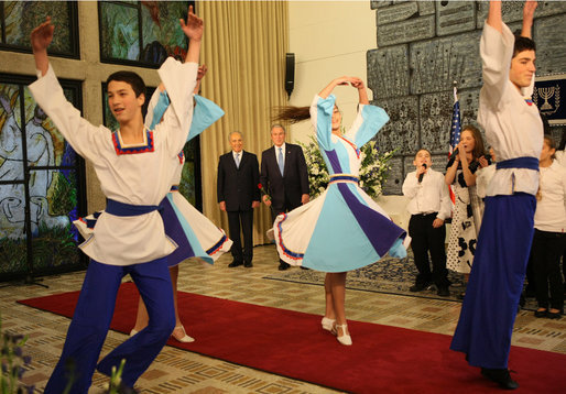 President George W. Bush and President Shimon Peres of Israel watch as a group of youthful entertainers performs Wednesday, Jan. 9, 2008, at the President’s residence in Jerusalem. White House photo by Eric Draper