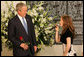 President George W. Bush listens as a young performer sings “Somewhere Over the Rainbow,” Wednesday, Jan. 9, 2008, during his meeting with the President of Israel, Shimon Peres, in Jerusalem. White House photo by Chris Greenberg