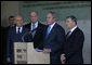 President George W. Bush makes a brief statement after his visit Friday, Jan. 11, 2008, to Yad Vashem, the Holocaust Martyrs’ and Heroes’ Remembrance Authority, in Jerusalem. Standing with him from left are: President Shimon Peres, left, of Israel; Prime Minister Ehud Olmert, of Israel, and Avner Shalev, Chairman of Yad Vashem Directorate. White House photo by Eric Draper