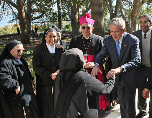 President George W. Bush is greeted by nuns at the Church of the Beatitudes in Galilee Friday, Jan. 11, 2008. The stop marked the last in Israel for President Bush who later arrived in Kuwait City, Kuwait, on the second leg of his eight-day Mideast visit. White House photo by Eric Draper