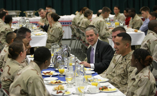 President George W. Bush joins military personnel and coalition forces for breakfast Sunday, Jan. 13, 2008 in Manama, Bahrain. The President took the opportunity to visit the U.S. Naval Forces Central Command before departing Bahrain for Abu Dhabi, United Arab Emirates. White House photo by Eric Draper