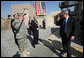 President George W. Bush nods his head and salutes Gen. David Petraeus as he departs Camp Arifjan Saturday, Jan. 12, 2008, during his last stop in Kuwait. White House photo by Eric Draper