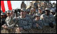 Members of the military line the path to the stage as President George W. Bush appeared Saturday, Jan. 12, 2008, at Camp Arifjan, Kuwait. An estimated 4,000 troops heard the President say "…History will say, it was when you were called upon, you served, and the service you rendered was absolutely necessary to defeat an enemy overseas so we do not have to face them here at home." White House photo by Eric Draper