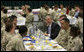 President George W. Bush joins military personnel and coalition forces for breakfast Sunday, Jan. 13, 2008 in Manama, Bahrain. The President took the opportunity to visit the U.S. Naval Forces Central Command before departing Bahrain for Abu Dhabi, United Arab Emirates. White House photo by Eric Draper