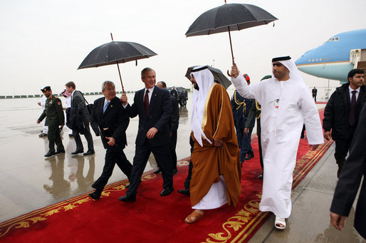 President George W. Bush and President Sheikh Khalifa bin Zayed Al Nayhan of the United Arab Emirates, walk the red carpet after the arrival Sunday, Jan. 13, 2008, of President Bush at Abu Dhabi International Airport. White House photo by Eric Draper