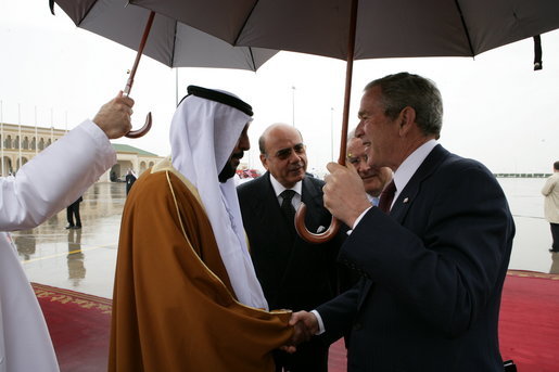 President George W. Bush is greeted by President Sheikh Khalifa bin Zayed Al Nayhan after arriving Sunday, Jan. 13, 2008, at Abu Dhabi International Airport in the United Arab Emirates. White House photo by Chris Greenberg