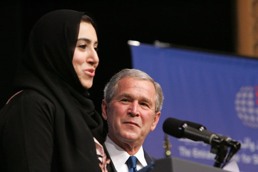 President George W. Bush is introduced Sunday, Jan. 13, 2008, by Aida Abdullah Al-Azdi, Executive Director, Emirates Center for Strategic Studies Research, before his speech at the Emirates Palace Hotel in Abu Dhabi. White House photo by Eric Draper