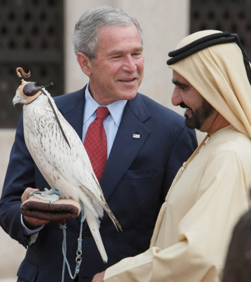 President George W. Bush holds a falcon shown to him by Sheikh Mohammed Bin Rashid al-Maktoum, Vice President and Prime Minister of the United Arab Emirates, Monday, Jan. 14, 2008, during a visit to Sheikh Saeed Al Maktoum House in Dubai. White House photo by Eric Draper