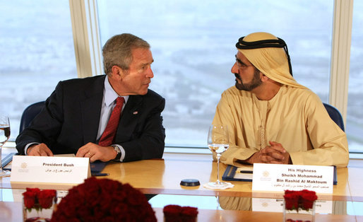 With Dubai as a backdrop, President George W. Bush and Sheikh Mohammed bin Rashid Al Maktoum participate in a roundtable discussion Monday, Jan. 14, 2008, with young Arab leaders at the Burj Al Arab Hotel. White House photo by Eric Draper