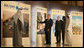 President George W. Bush points to a display in the Masdar Exhibition Monday, Jan. 14, 2008, at the Emirates Palace Hotel. Created in 2006, Masdar is a global cooperative platform for open engagement in the search for solutions to some of mankind's most press issues, such as energy security, climate change and truly sustainable human development. White House photo by Eric Draper