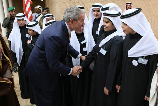 President George W. Bush greets school children during his visit Tuesday, Jan. 15, 2008, to Al Murabba Palace in Riyadh. The President is spending his last day in Saudi Arabia before continuing on to Egypt en route home to Washington, D.C. White House photo by Eric Draper