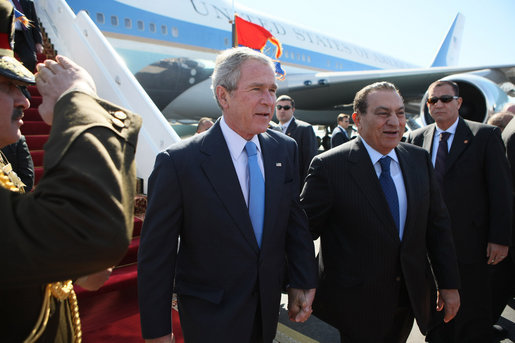President George W. Bush walks with Egyptian President Hosni Mubarak after arriving at Sham El Sheikh International Airport, Wednesday, Jan. 16, 2008. White House photo by Eric Draper